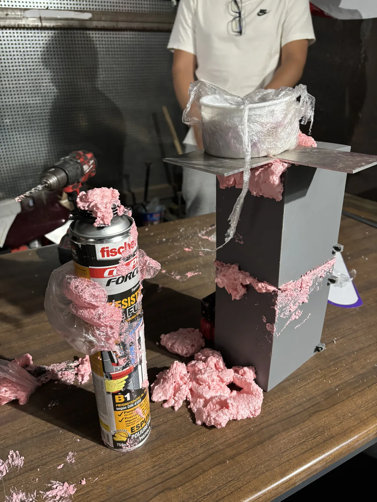 Expanding foam, applied with pliers instead of a proper gun